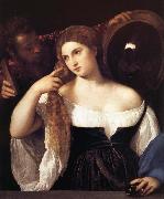 TIZIANO Vecellio Portrait d'une femme a sa toilette oil